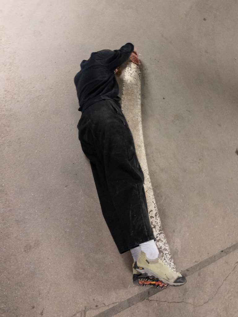 In a parking lot in Sweeden, I gave way to my desire to touch the floor with no shame.